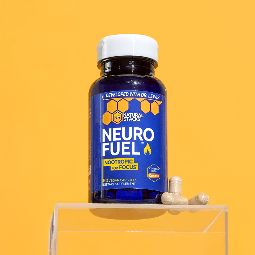 Bottle of NeuroFuel with capsules on a transparent stand with a yellow background
