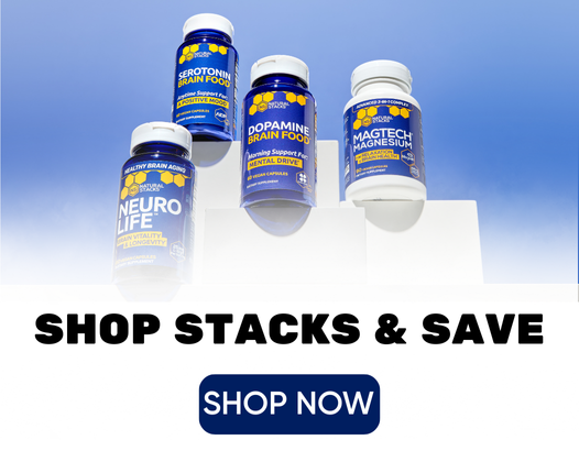 Five supplement bottles with blue labels against a clear sky background, promoting stacking and saving.
