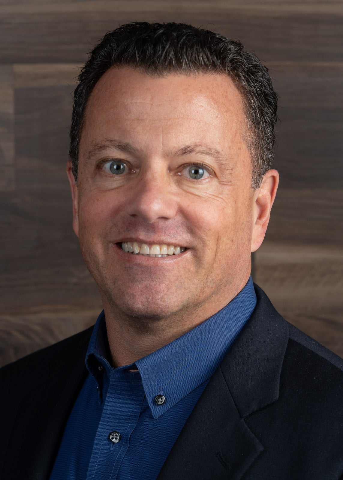 headshot of man smiling