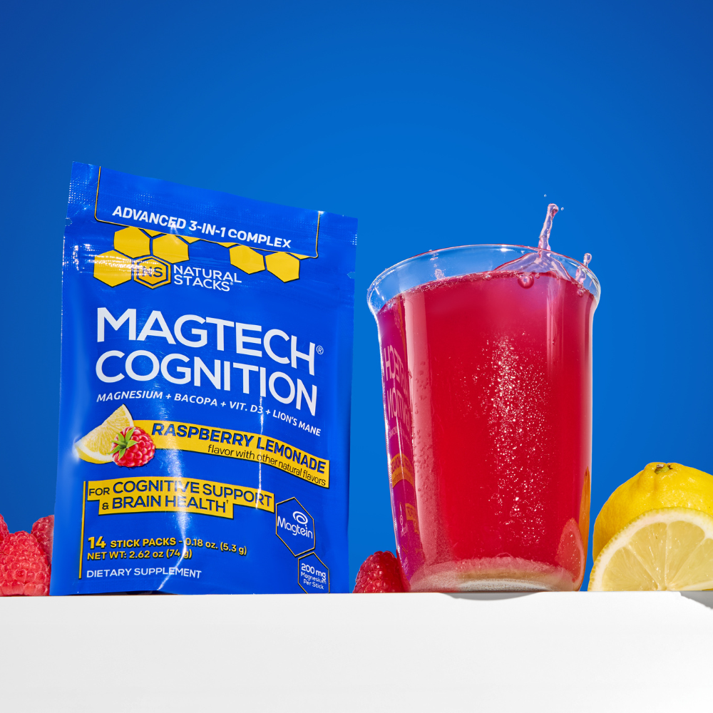 MAGTECH Cognition Raspberry Lemonade supplement package with a glass of red liquid on a blue background