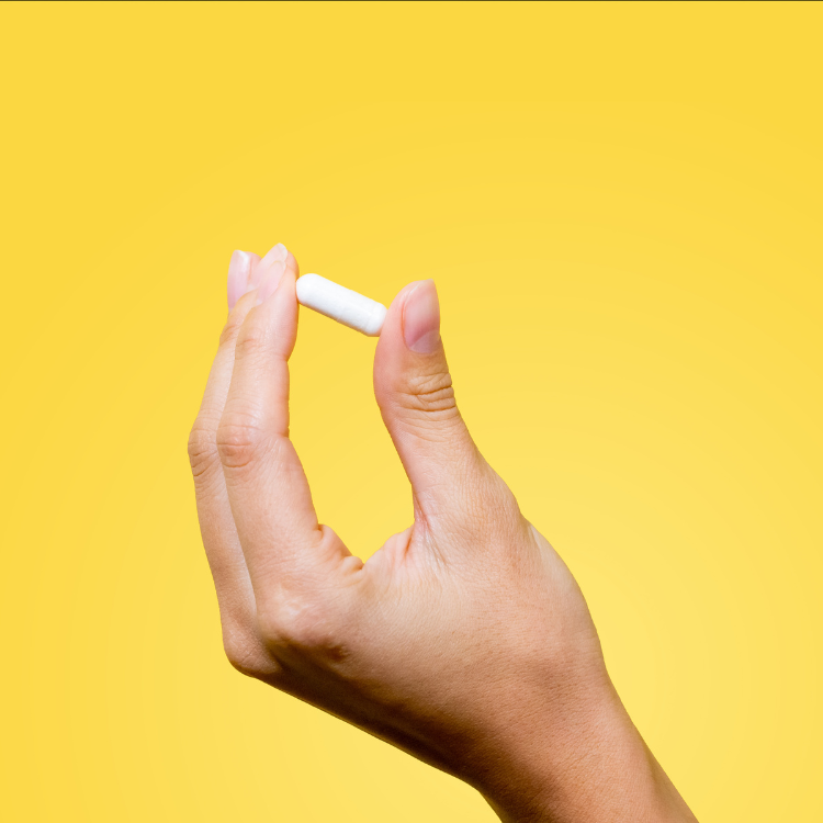 Hand with pill