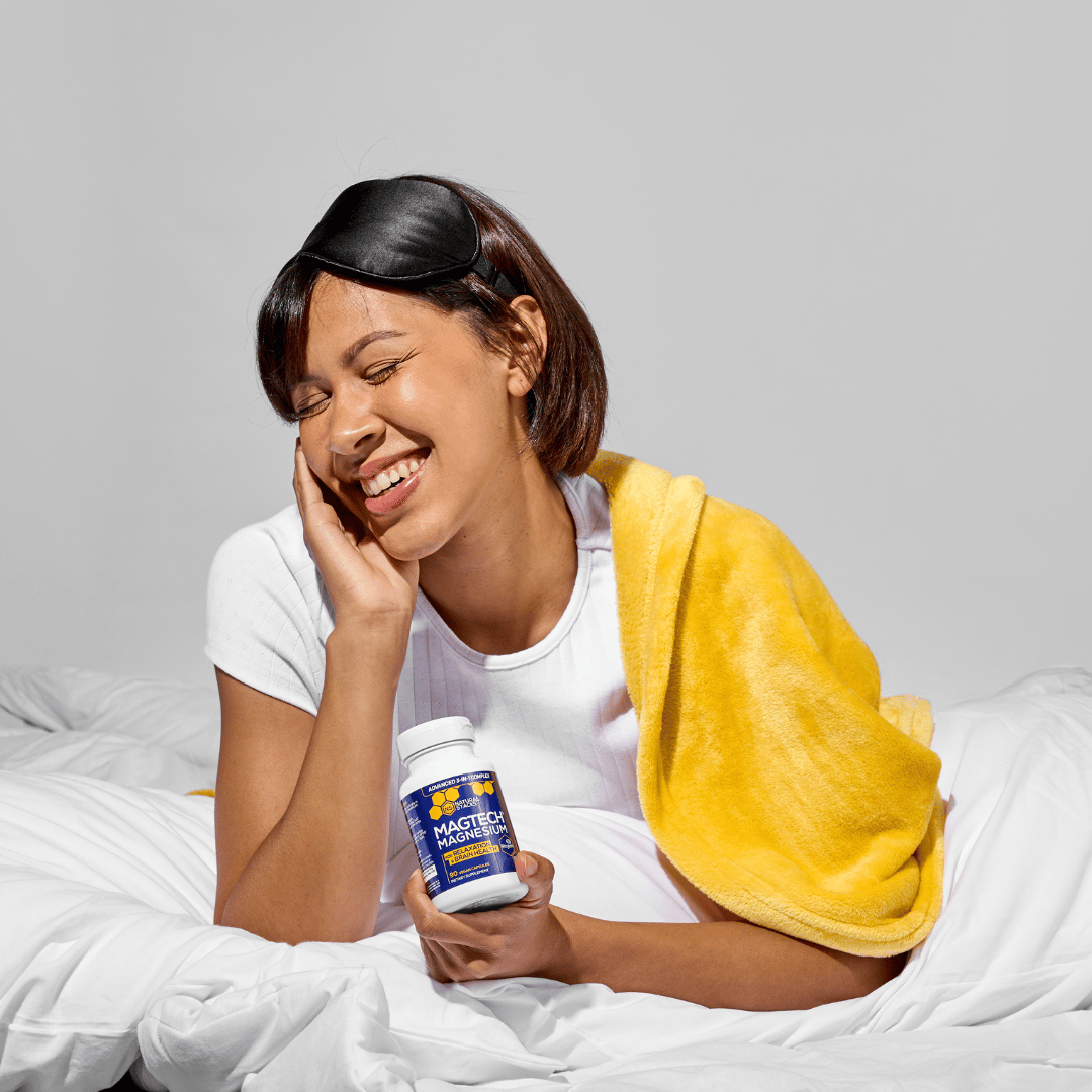 Woman holding MagTech magnesium bottle